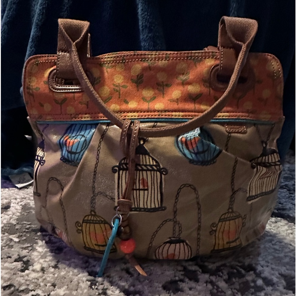 Fossil Bird Cage purse. Gently used like new.